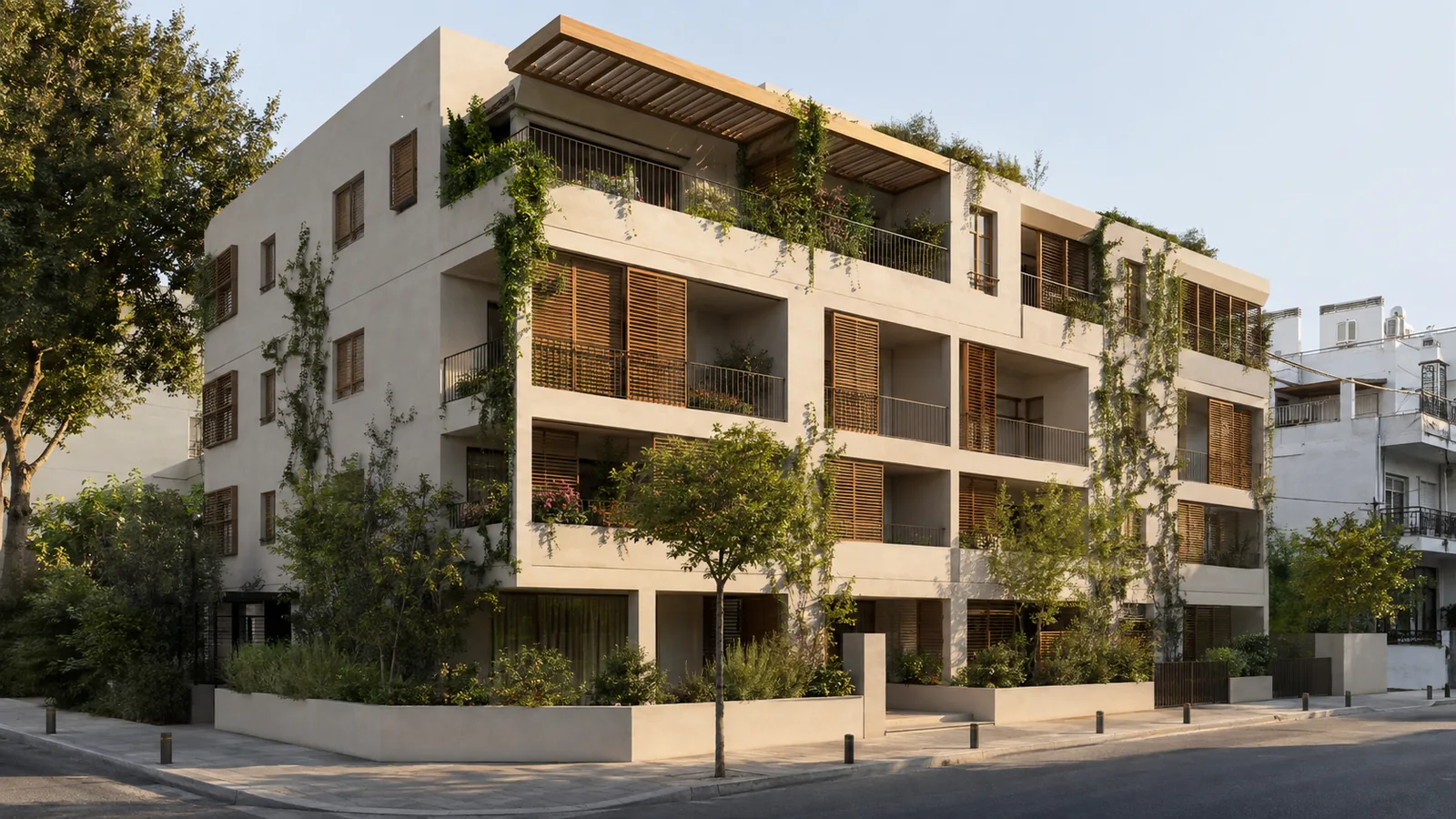 Σύγχρονη πολυκατοικία με ανοιχτόχρωμη ορυκτή όψη και φύτευση